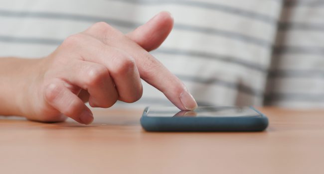 Use of mobile phone on table